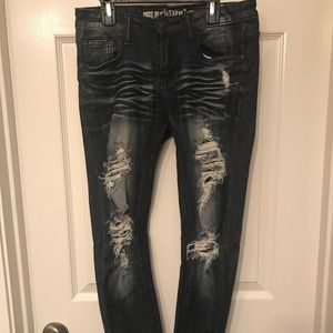 Machine distressed jeans